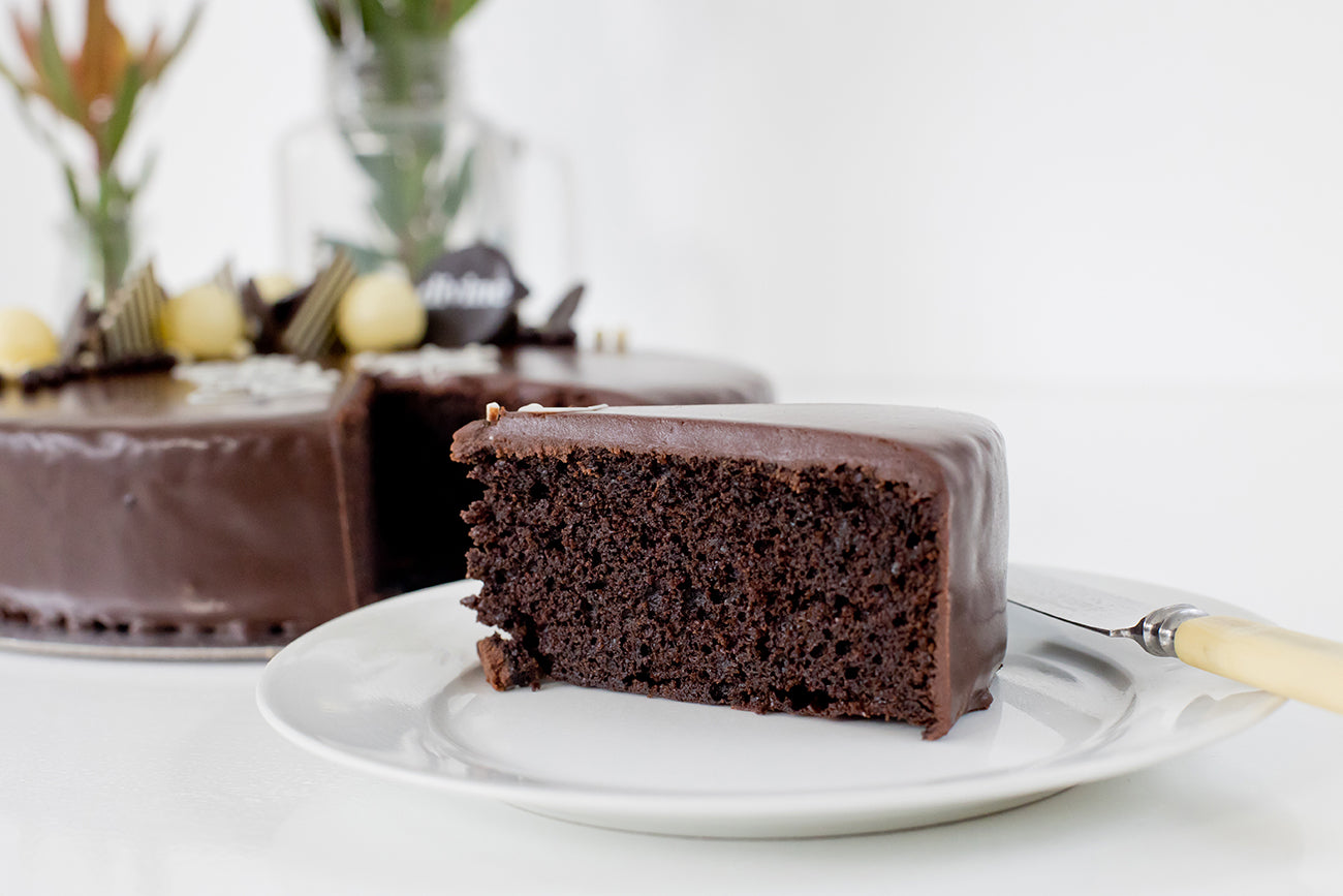 Slice-of-Chocolate-Birthday-Deluxe-Cake-Divine.jpg